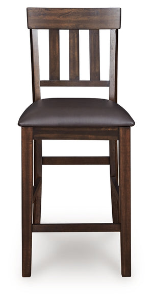 Haddigan - 7 Pc. - Dining Set - Counter Butterfly Ext. Table & 6 Uph Barstools